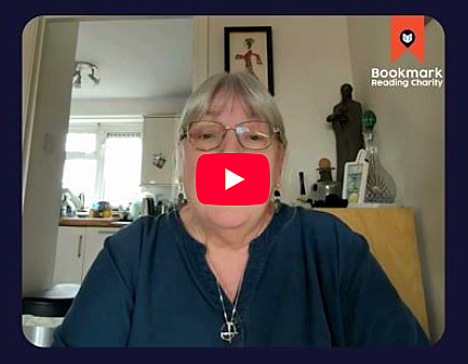 Bookmark volunteer speaking to the camera in her home