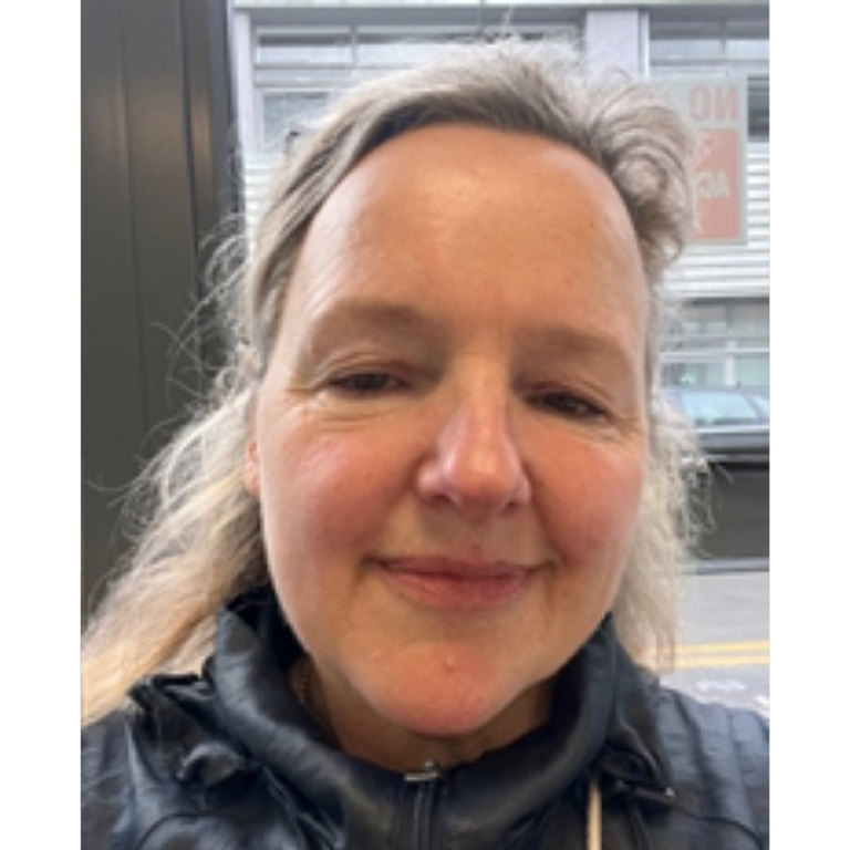 Bookmark volunteer headshot. She's smiling at the camera.