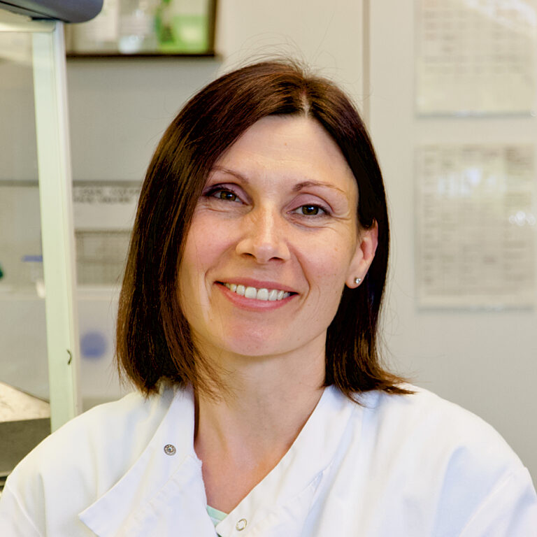 A photo of one of our staff in the laboratory