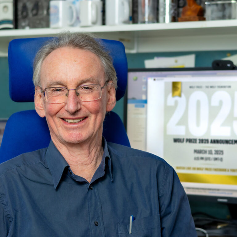 an image of jonathan jones in his office in front of his computer