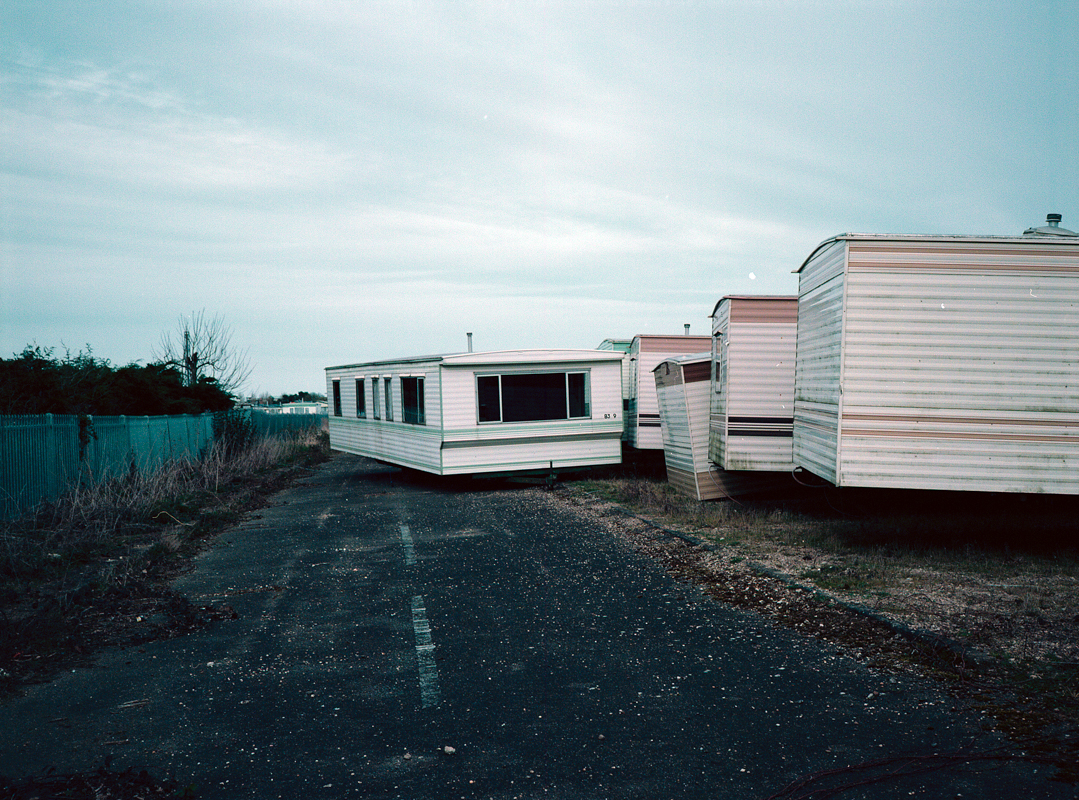 Image of a 2p sign on a beach