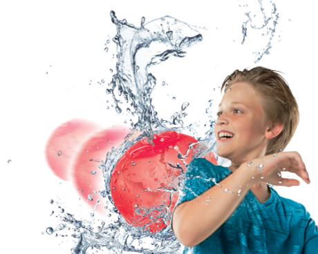 Boy playing with water wubble