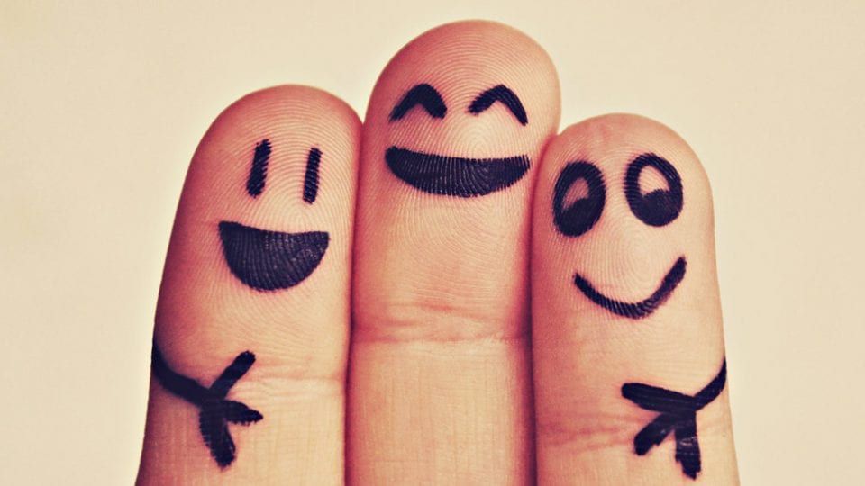 Smily faces on fingers